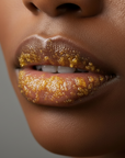 Close-up of lips with gold standard lip scrub on a lips