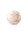 Private Peach Pink and yellow bath bomb on a white background